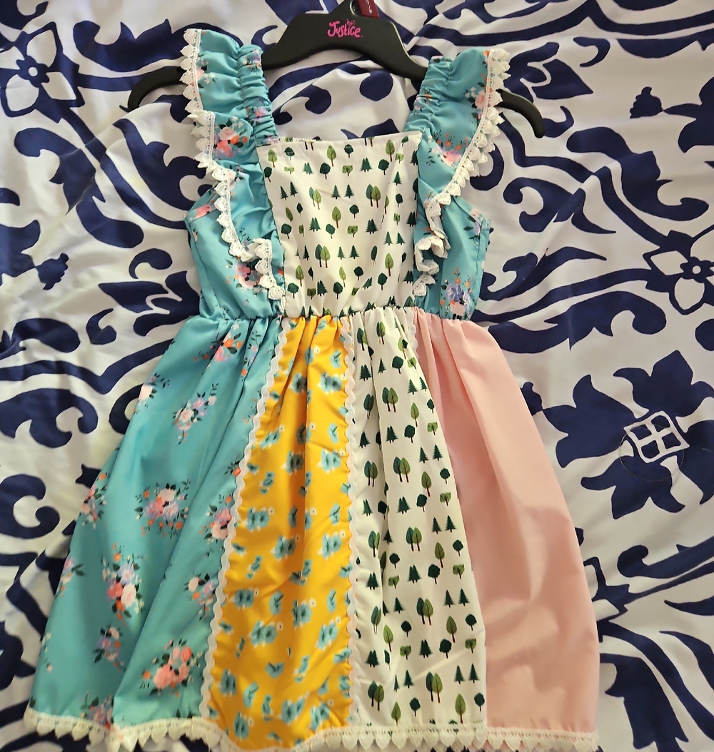 Justice Pastel Patchwork Ruffle Dress in Aqua, Yellow, Pink, and White